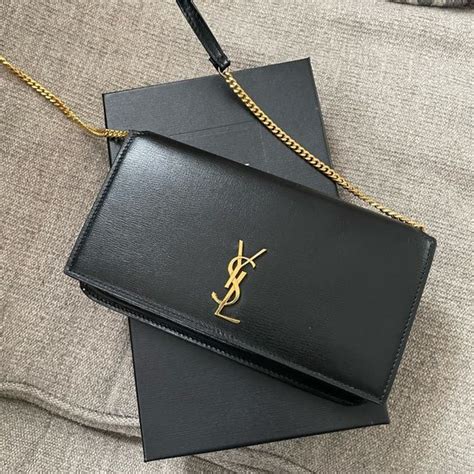 YSL phone holder vs Louis Vuitton